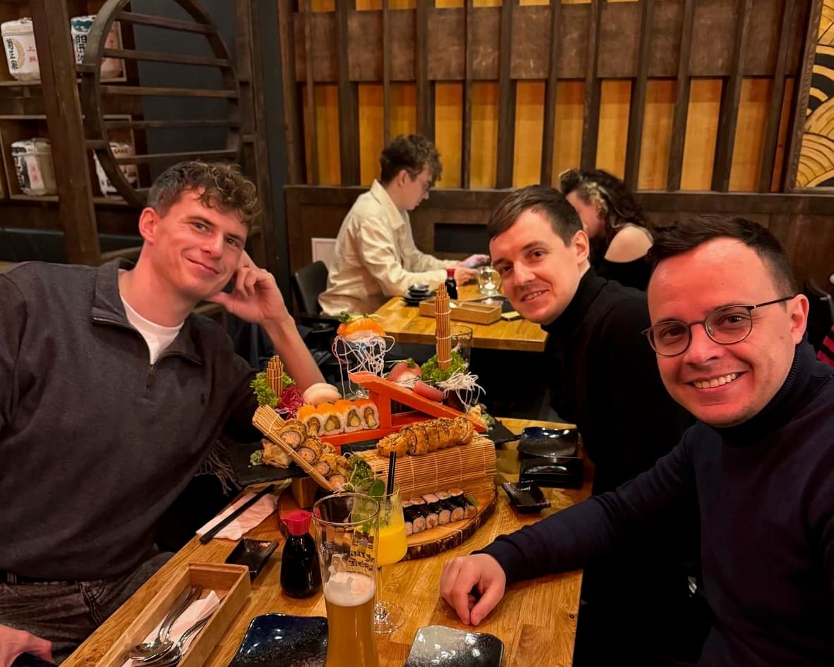 The three founders of Cherry Pie Labs at a table